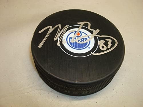 Мат Бенинг подписа хокей шайба Едмънтън Ойлърс с автограф 1А - за Миене на НХЛ с автограф